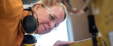 deep focus while woodworking, women woodworking, female classes
